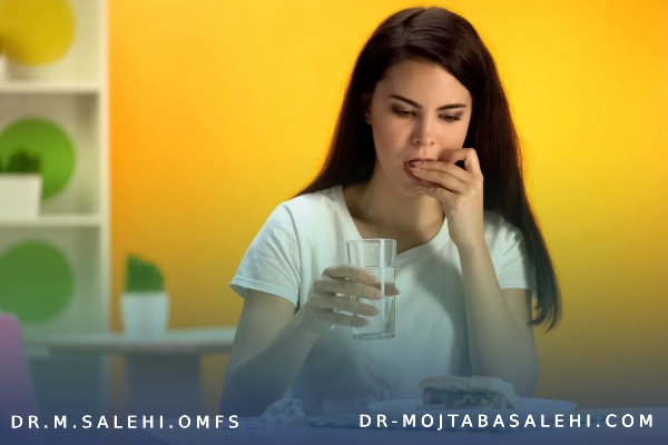 علت درد گرفتن فک هنگام غذا خوردن