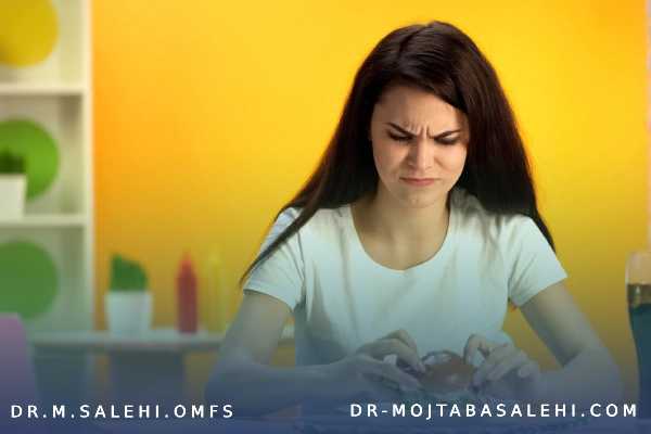 علت درد گرفتن فک هنگام غذا خوردن